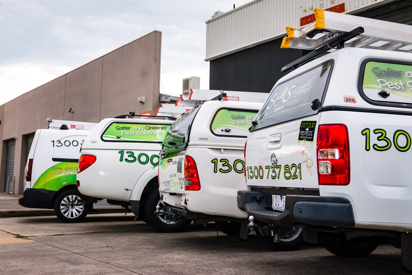 SOS Pest Control vehicles out on the road near Parkdale